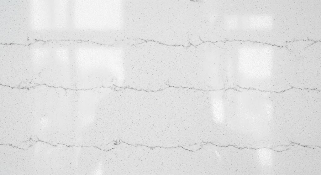 Macro close-up of a polished engineered quartz stone surface